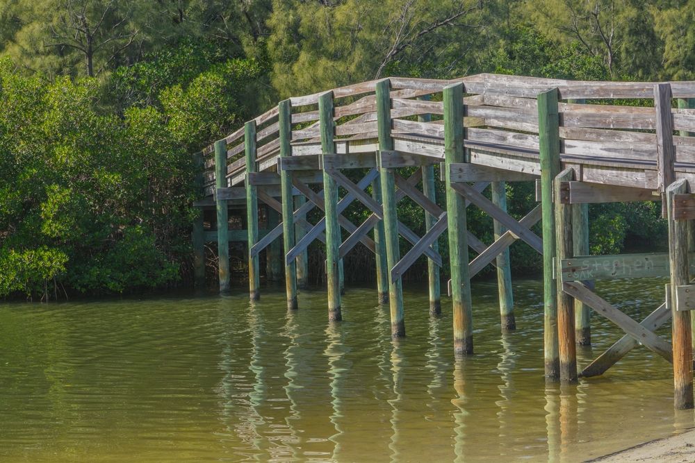 An old wooden bridge at Round Island Beach Park
