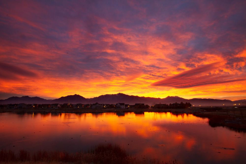 Scenic sunrise reflecting on Oquirrh Lake