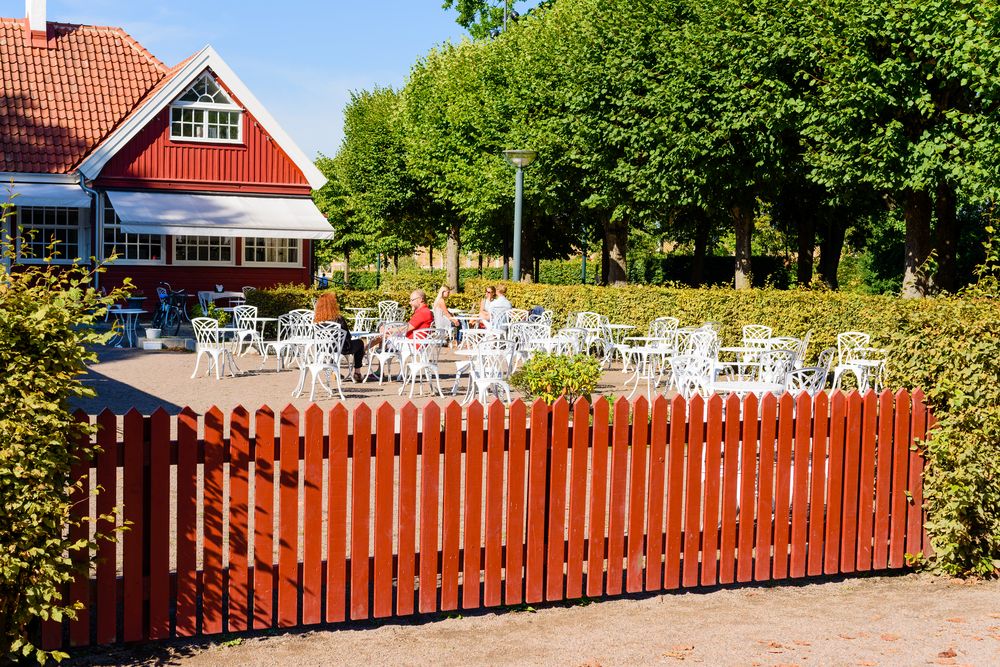 Visitors enjoying the snacks from the outdoor cafe at Stadsparken