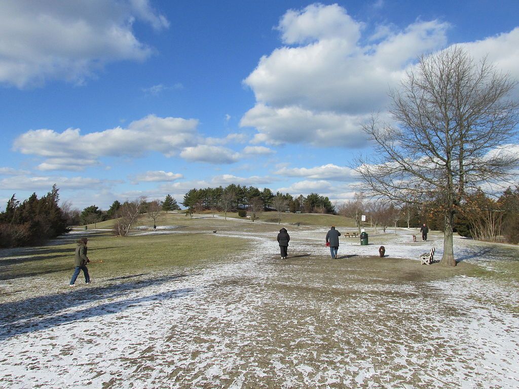 People strolling around Stodder's Neck during winter