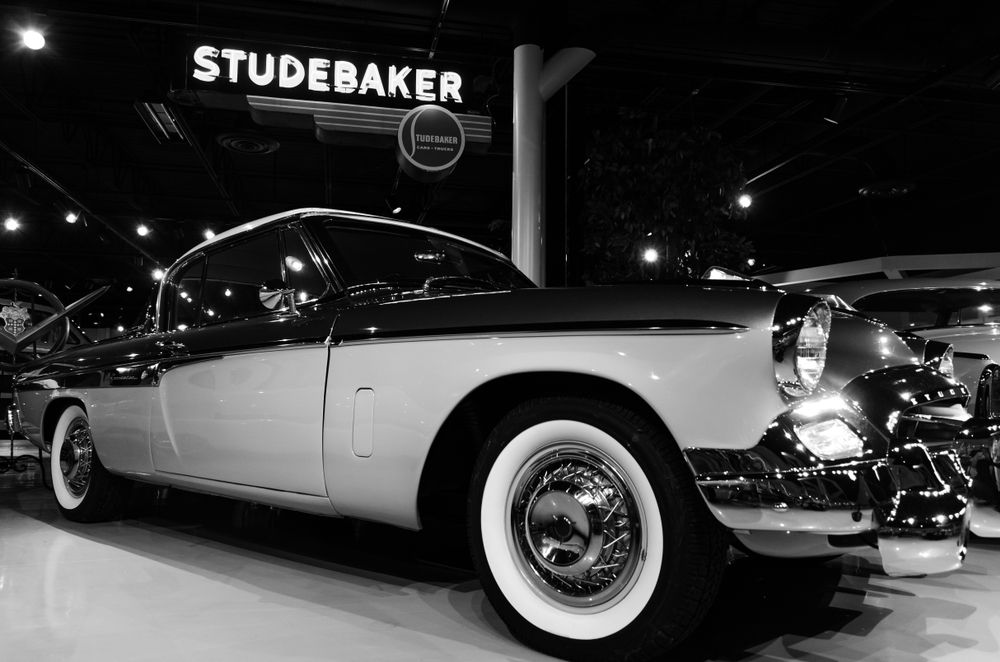 Display of a stylish white car at Studebaker national museum