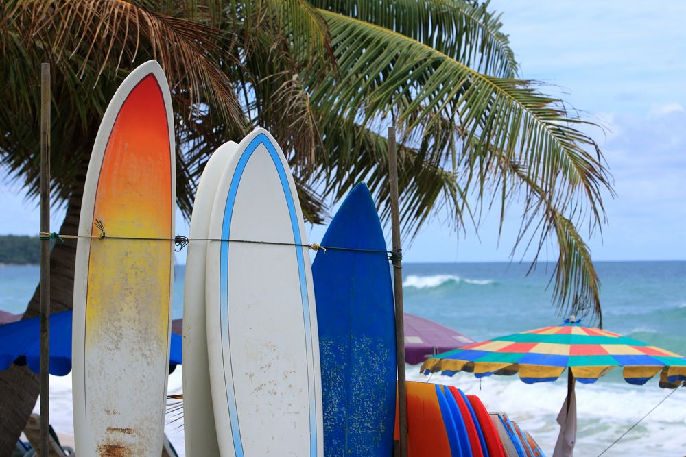 Surf boards lined up at Karon Beach