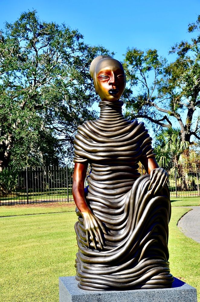Bronze sculpture of a woman at Sydney and Walda Besthoff Sculpture Garden