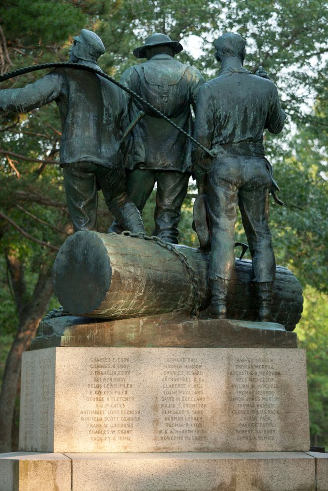 Back view of the Lumberman's Monument statue