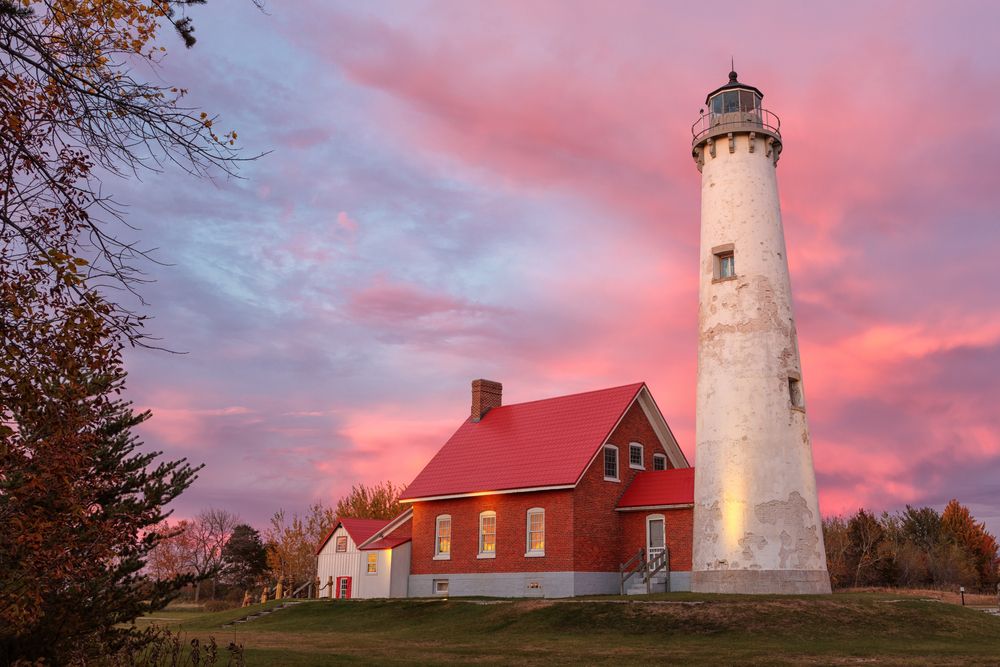 Colorful sunset over Tawas Point Lighthouse