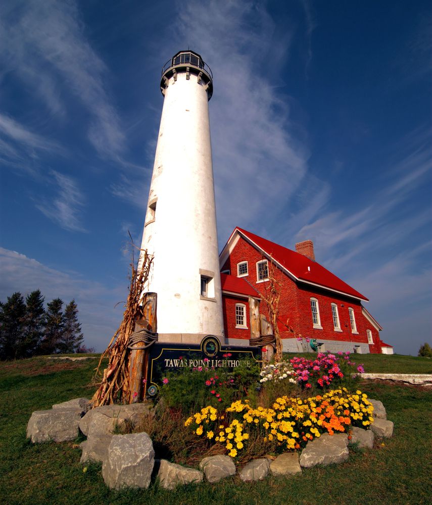 Colorful flowers in front of Tawas Point Lighthouse