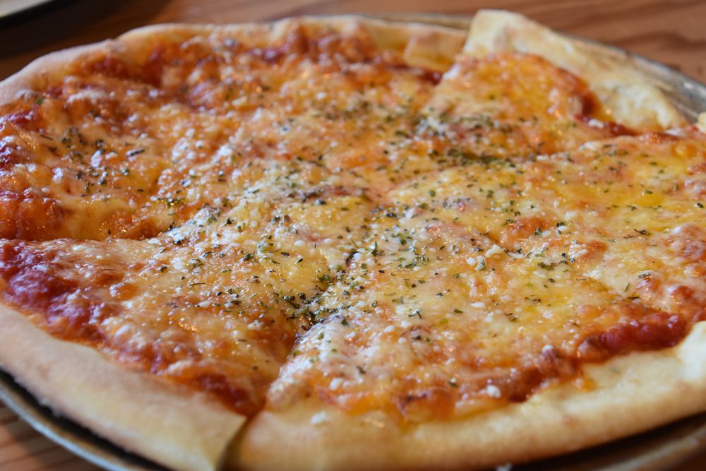 Freshly baked cheese pizza at Tillamook Creamery