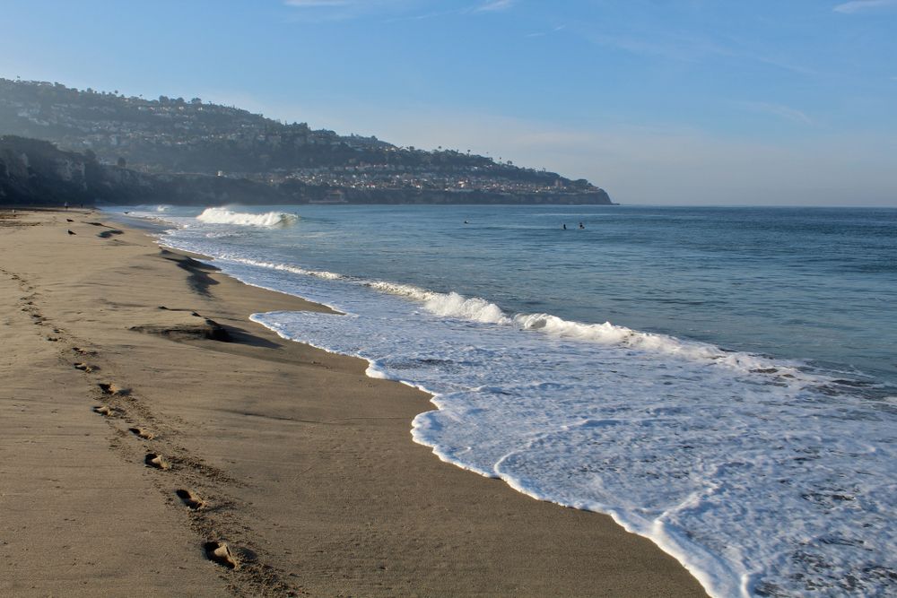 Calm waves crashing at Torrance Beach's shore
