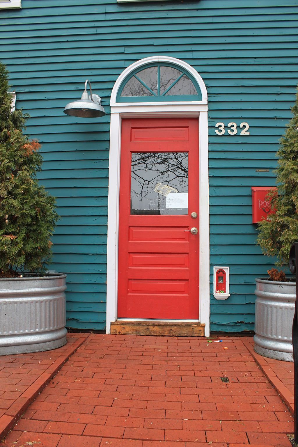 A bright red Urban Fairy Door