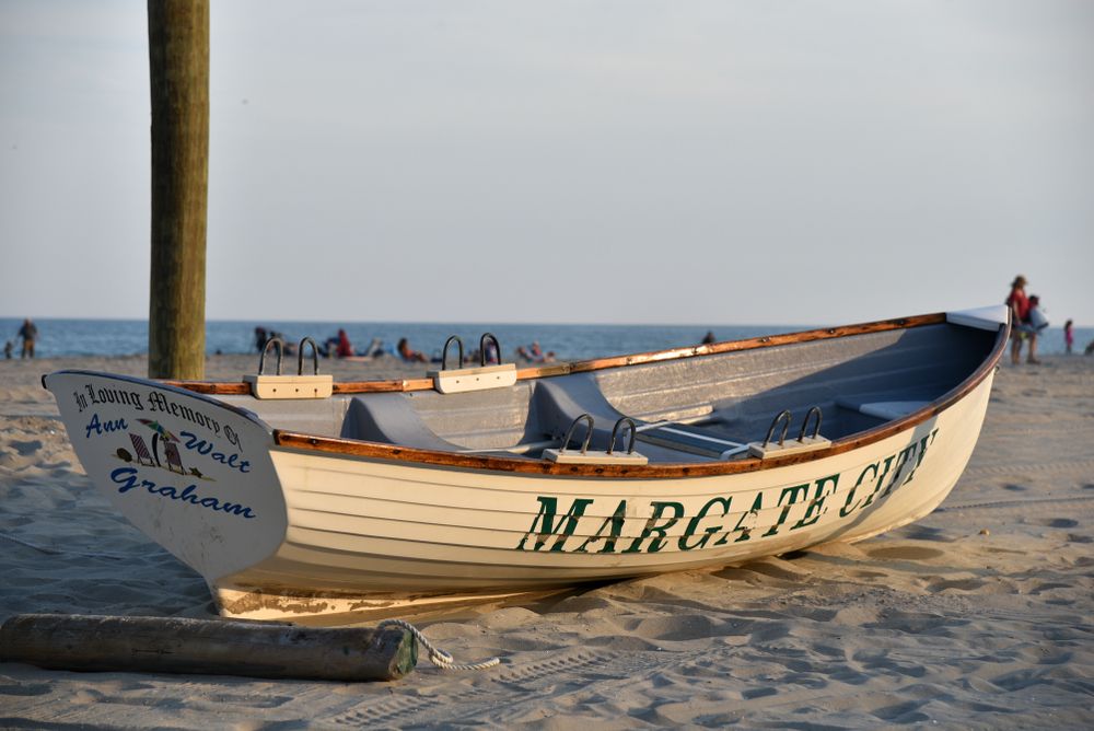 A wooden boat on the sand of Margate Beach