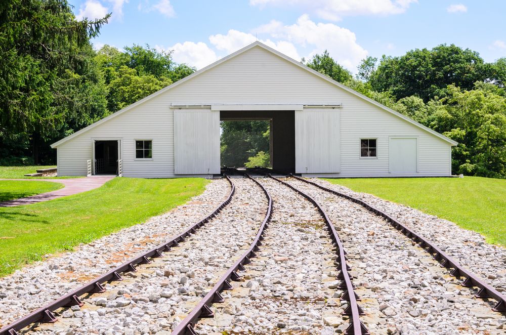 Rails and a white shed at Allegheny Portage Railroad National Historic Site
