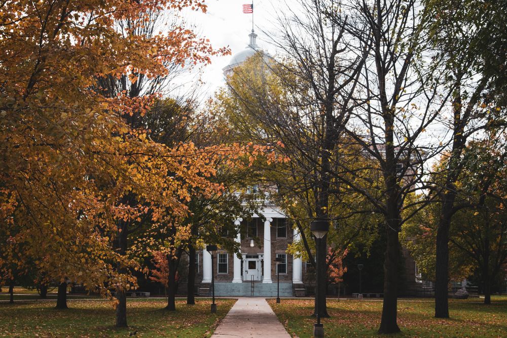 Fall trees in front of Lawrence University's building