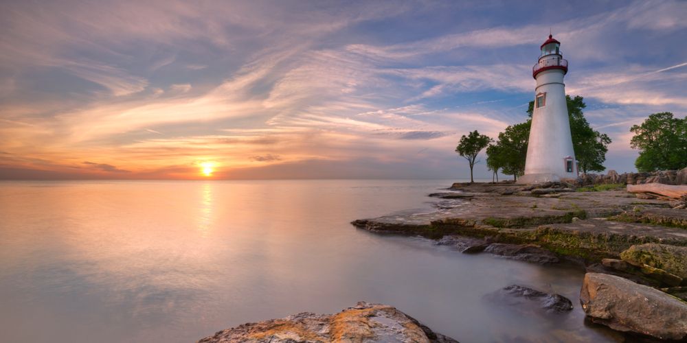 A beautiful sunset near the marblehead lighthouse on the edge of lake erie.