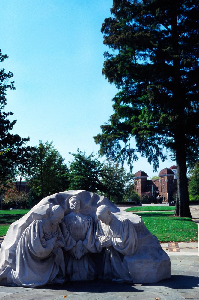 Statue of the praying priests at Kelly Ingram Park