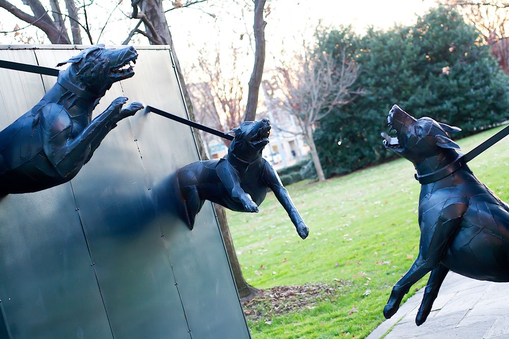Chained dogs statue at Kelly Ingram Park