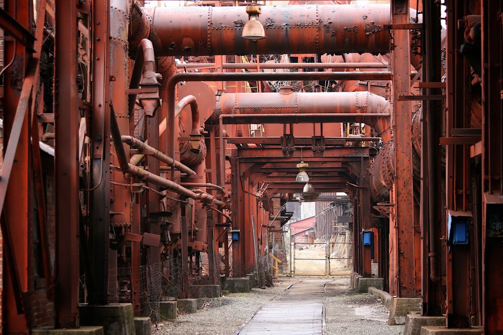 A pathway below the machines at Sloss Furnaces National Historic Landmark