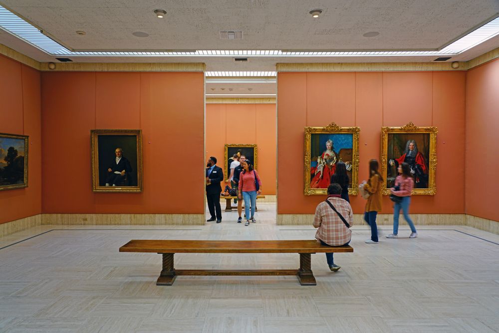 People admiring art in Timken Museum of Art
