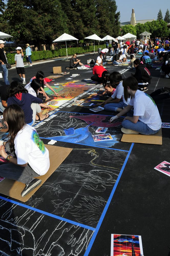Artists painting at the Via Arte’s Annual Italian Street Painting Festival