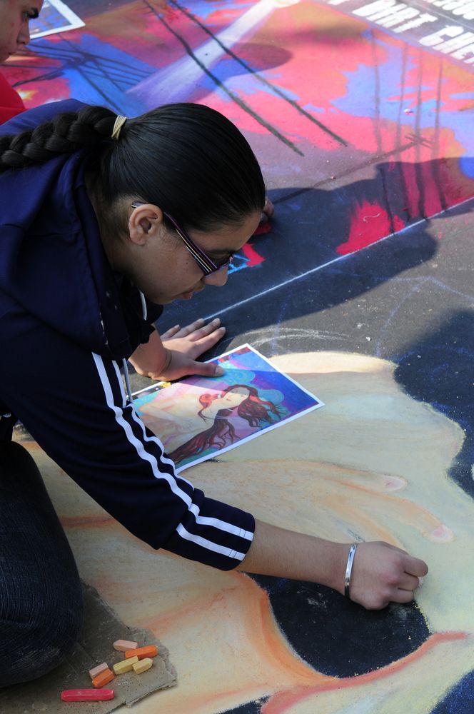 A participant at the Via Arte’s Annual Italian Street Painting Festival