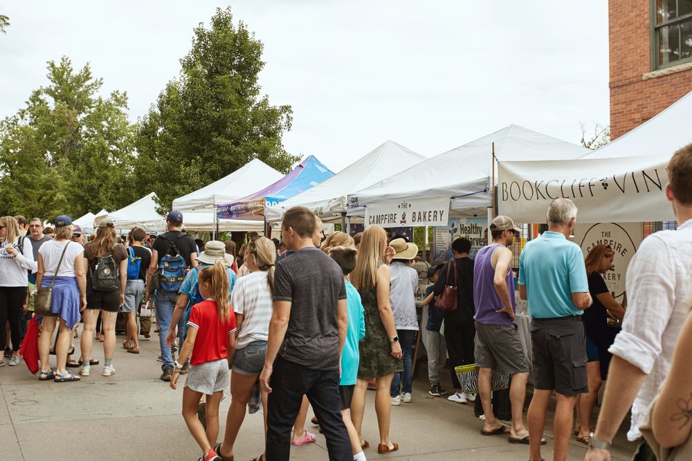 Vendors and shoppers at Boulder County Farmers Market
