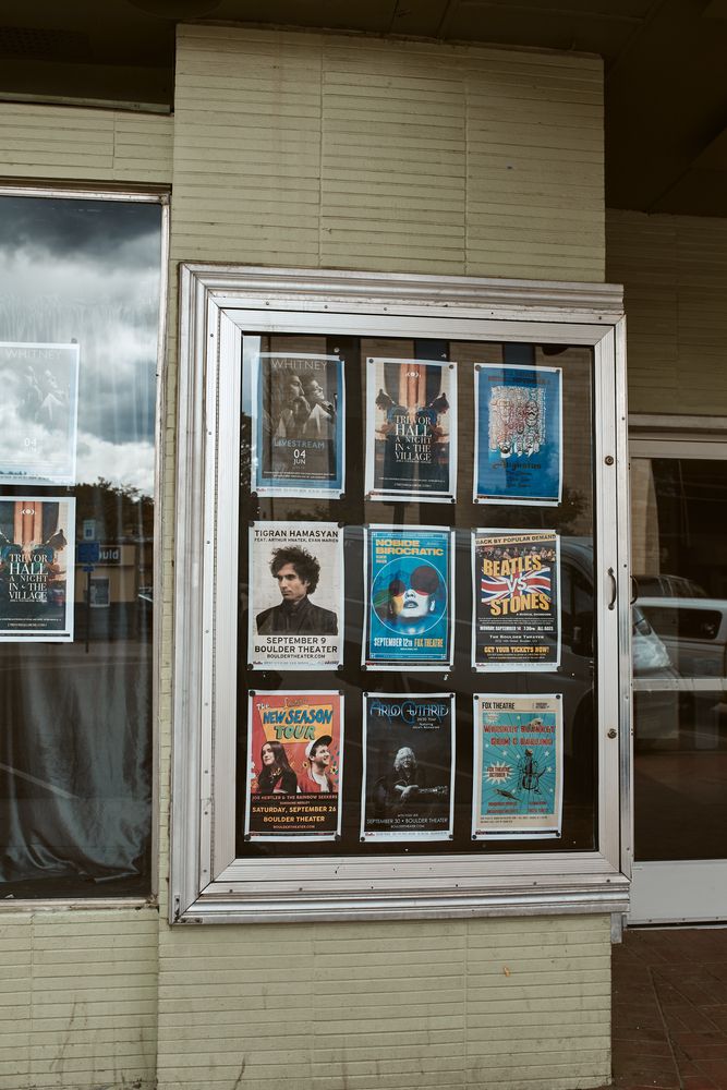 Posters on the Historic Boulder Theater's facade