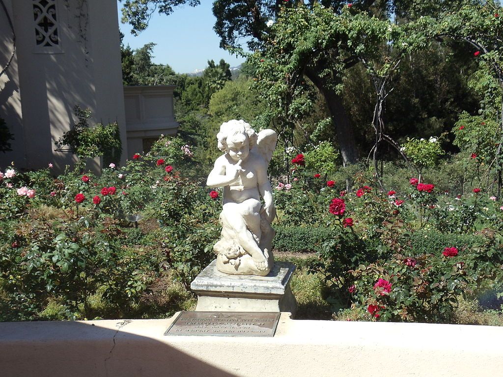 Rose garden and statue of Virginia Robinson Gardens