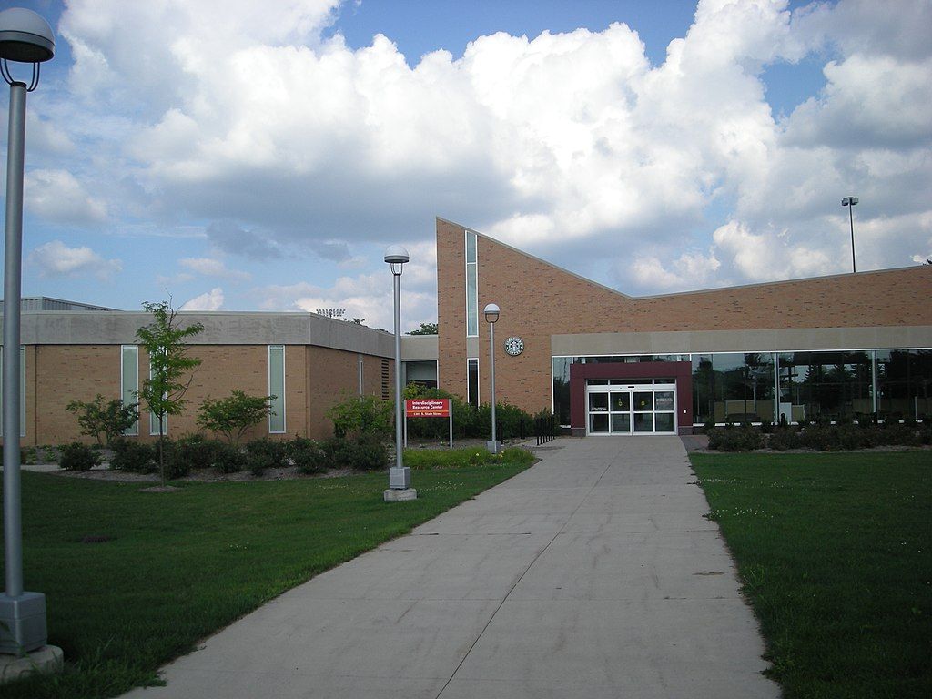 The Interdisciplinary Resource Center on ferris state university with green grass landscape.