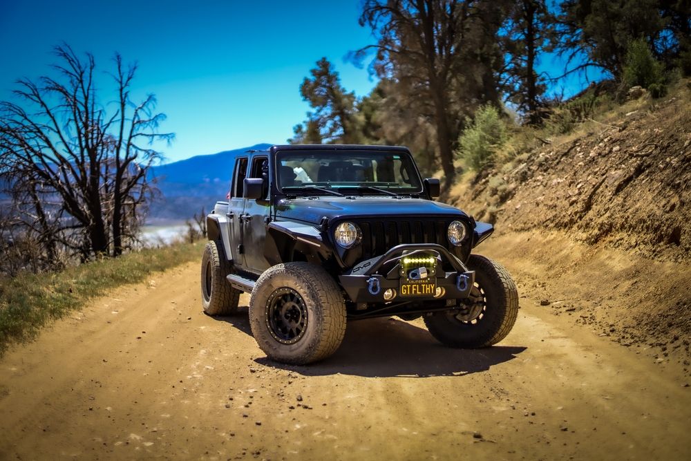 A jeep on the sandy road of black bear