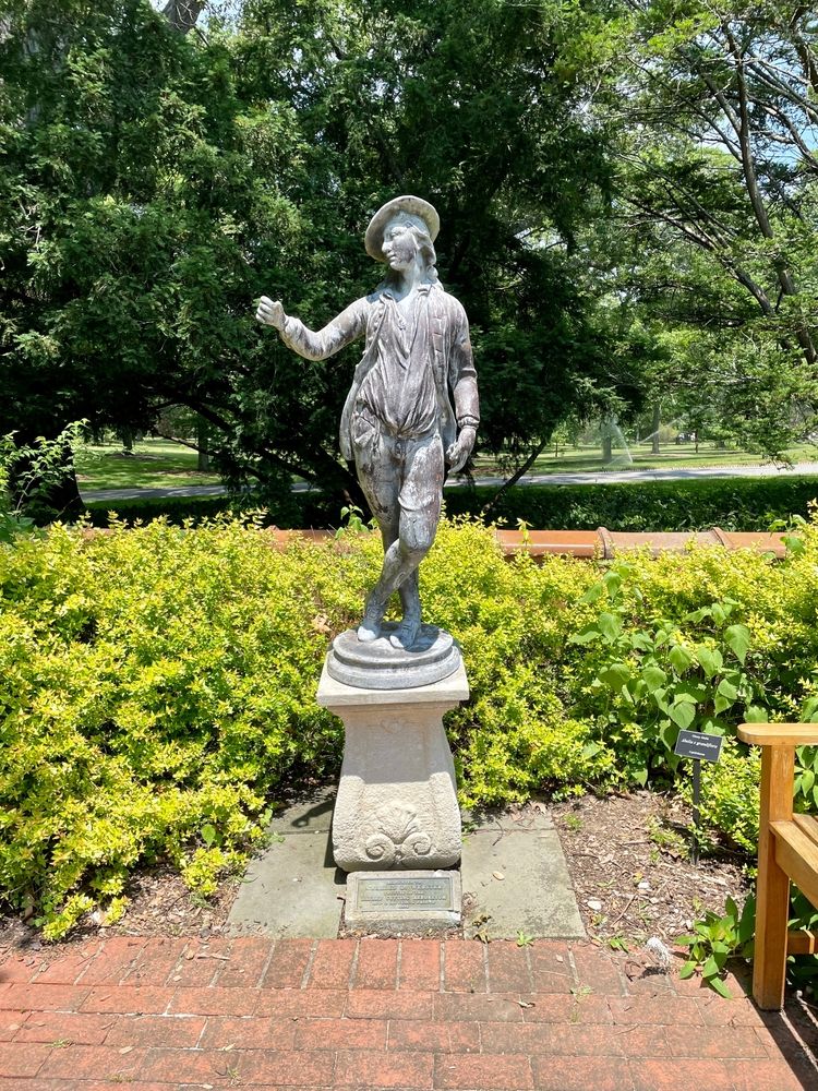 A statue at Bayard Cutting Arboretum
