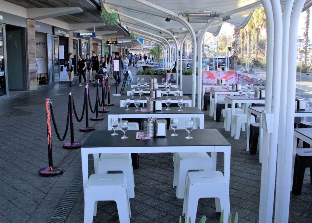 A restaurant's outdoor chair and tables at bondi