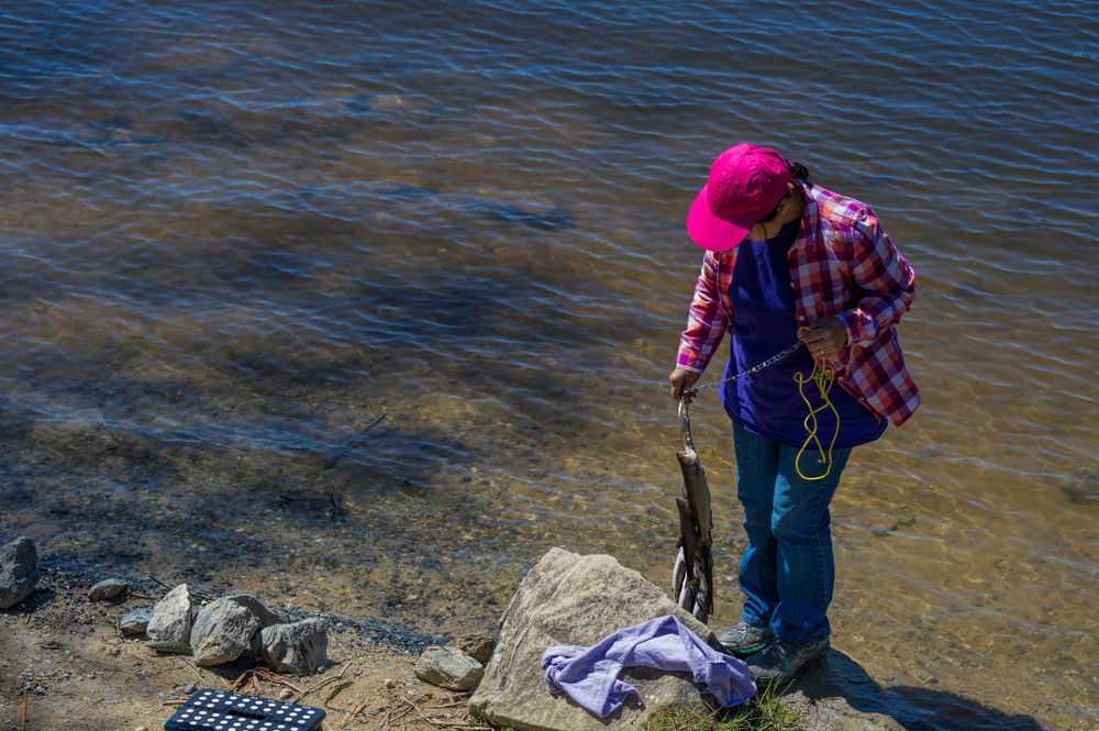 A woman with her fresh catch at Julian Price Park