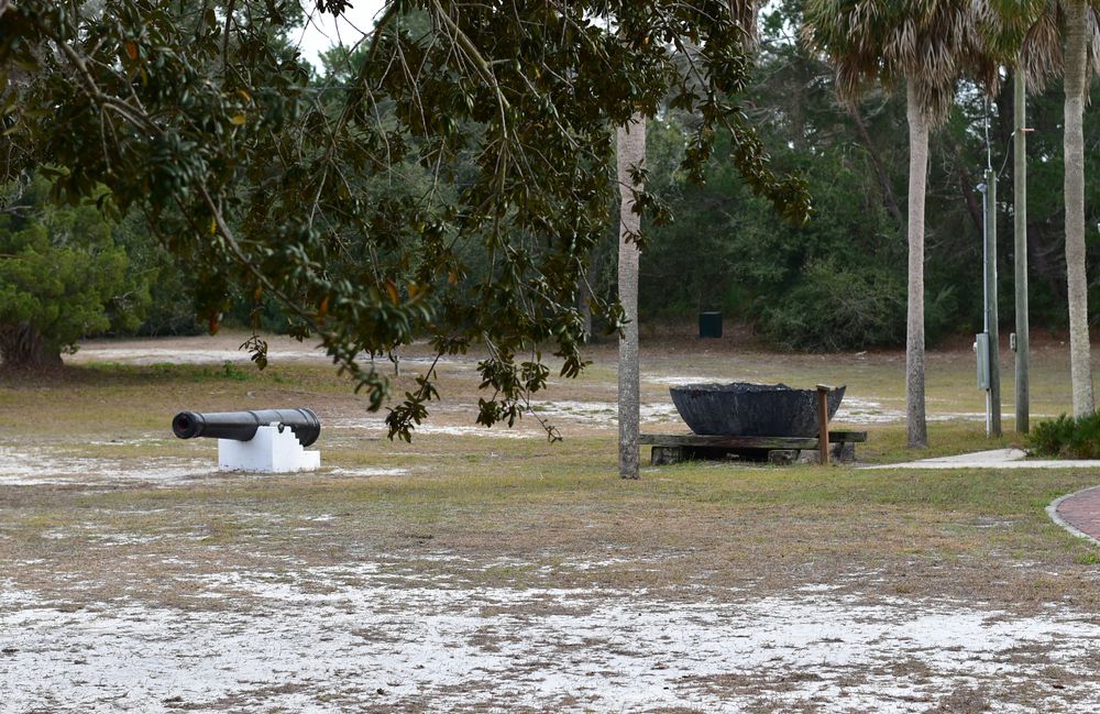 A canon displayed on Cedar Key Museum State Park grounds