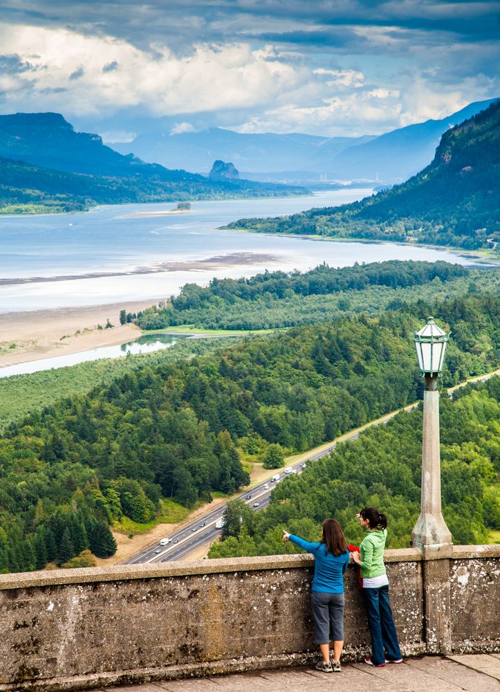 Two people admiring the views from Columbia River Gorge National Scenic Area