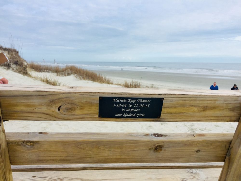 A quote on Kindred Spirit Mailbox's wooden bench