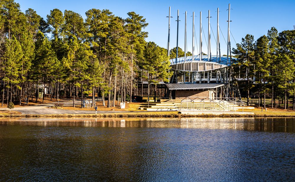 View of Koka Booth Amphitheater from across the lake