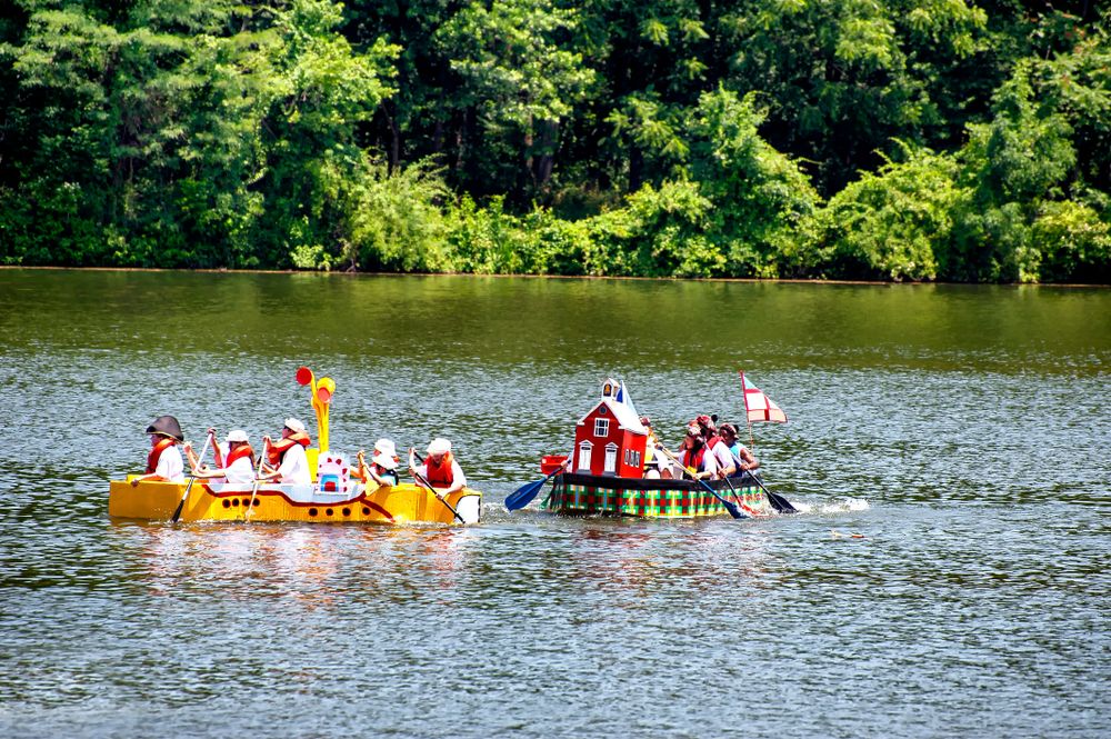 Paper boat makers participating on a festival at Lake Kittamaqundi