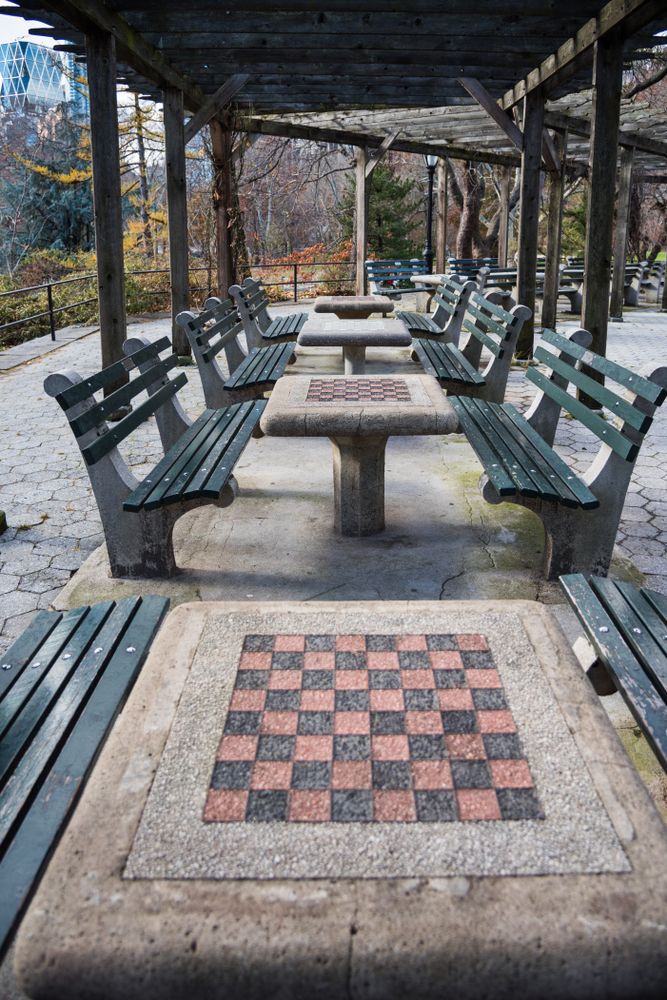 Chess tables and chairs at Chess & Checkers House