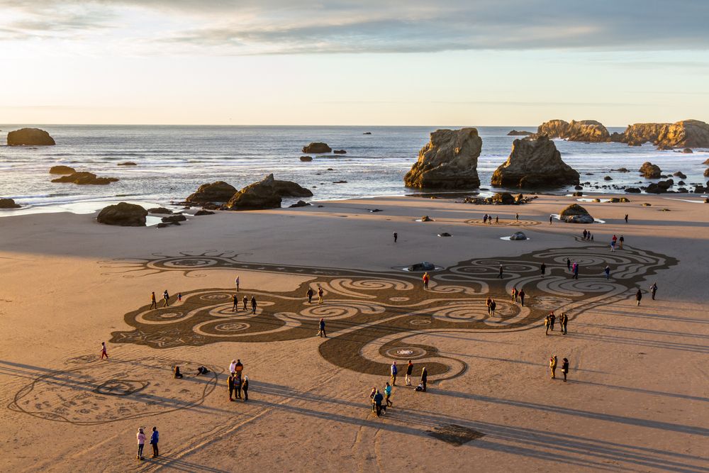 People at Circles in the Sand in Bandon, Oregon