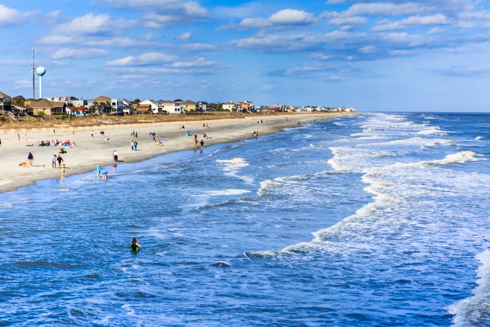 People swimming at Folly Beach