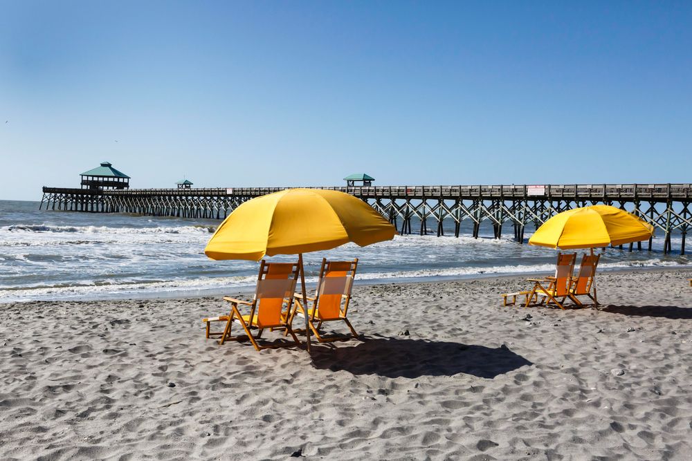 Beach chairs on Folly Beach shore