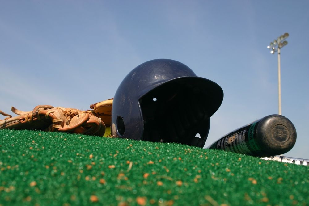 Baseball helmet and bat at Centennial Park