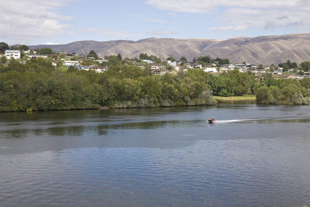 Boat cruising down Snake River