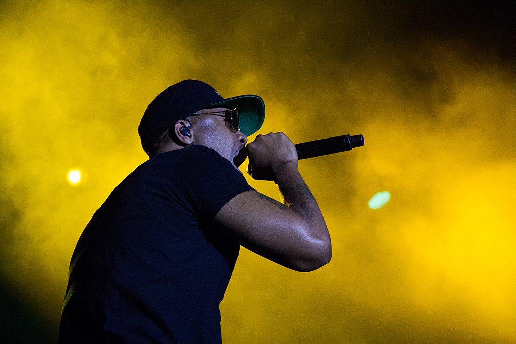 A rapper performing at the 80/35 Music Festival