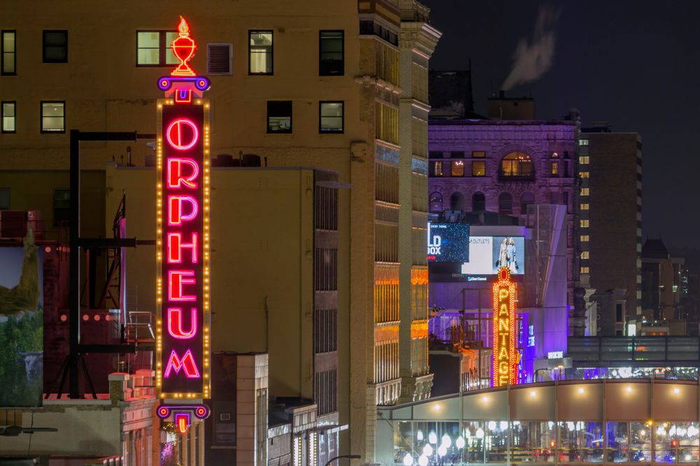 Neon lights of the Orpheum Theatre name sign