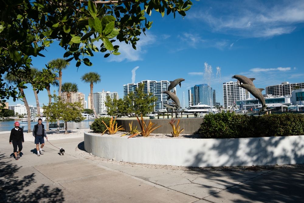 People walking along Sarasota Bayfront Park