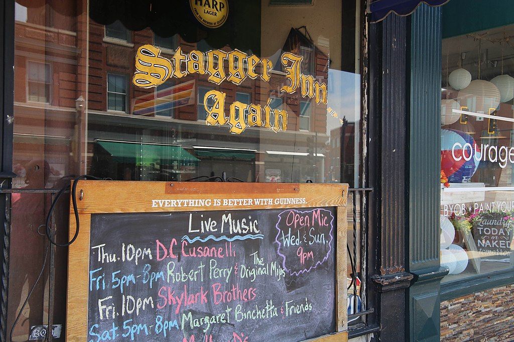 Name sign of Stagger Inn Again and its show schedules