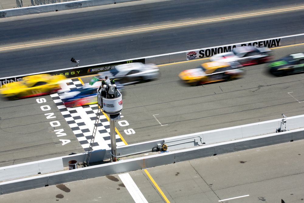 Fast racecars along Sonoma Raceway