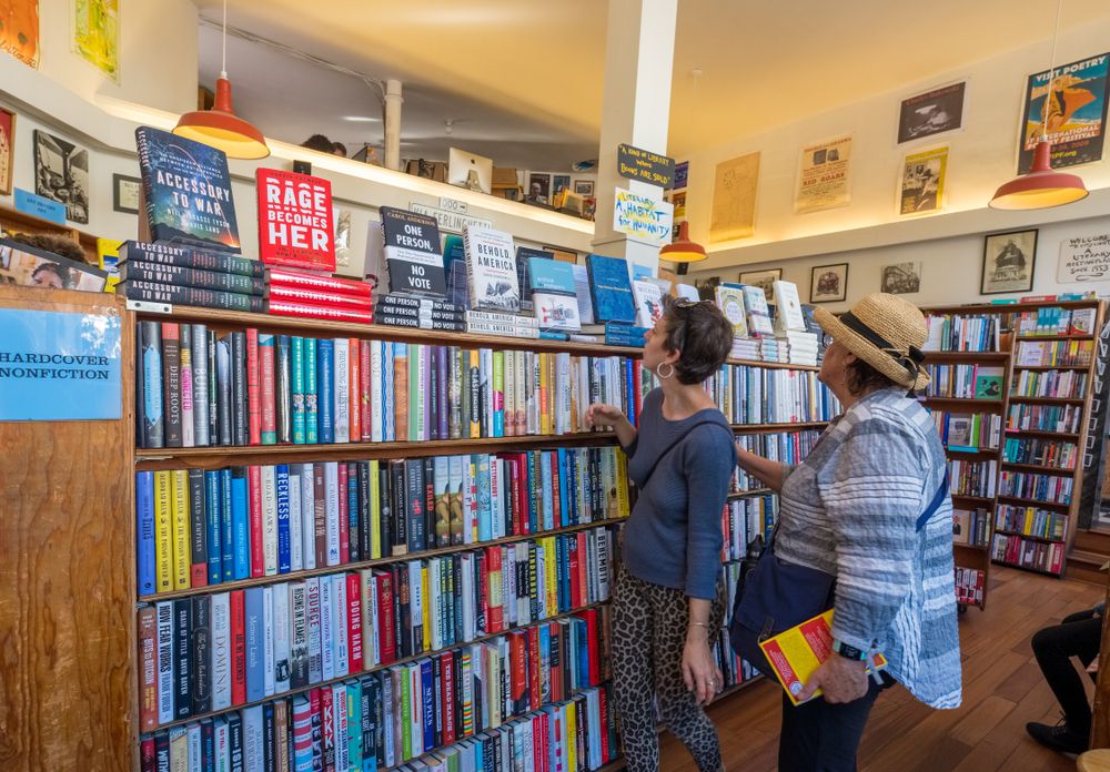 People choosing books in City Lights Booksellers & Publishers