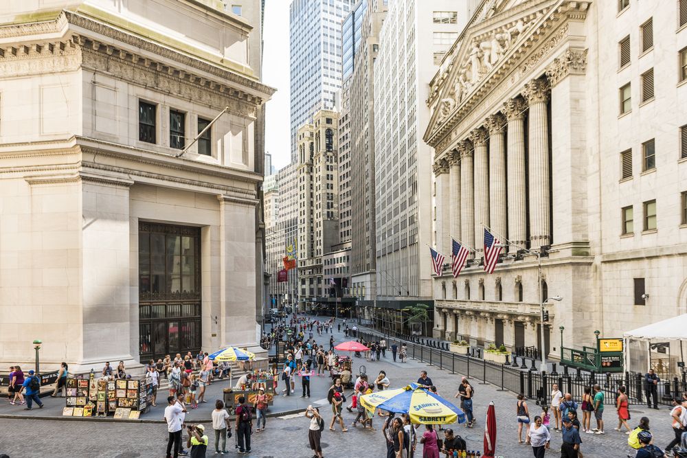 People touring around Wall Street