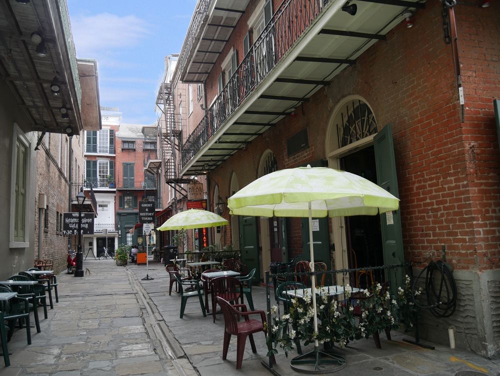 Outdoor table and chairs set up at Pirate's Alley